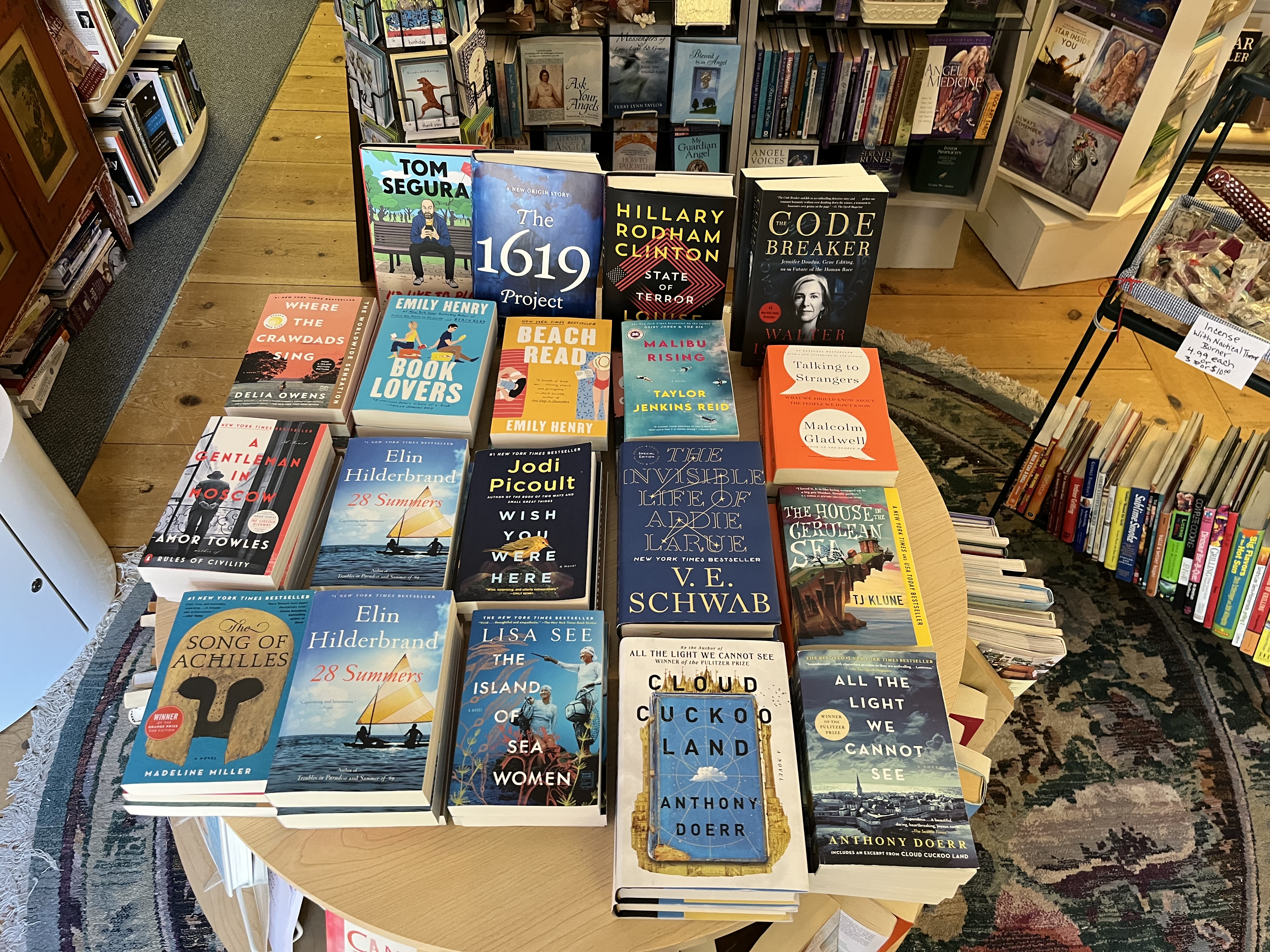 interior of book shop featuring many books on a round table